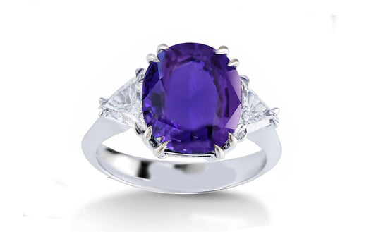 304 custom made unique oval purple sapphire center stone and trillion diamond accent three stone engagement ring