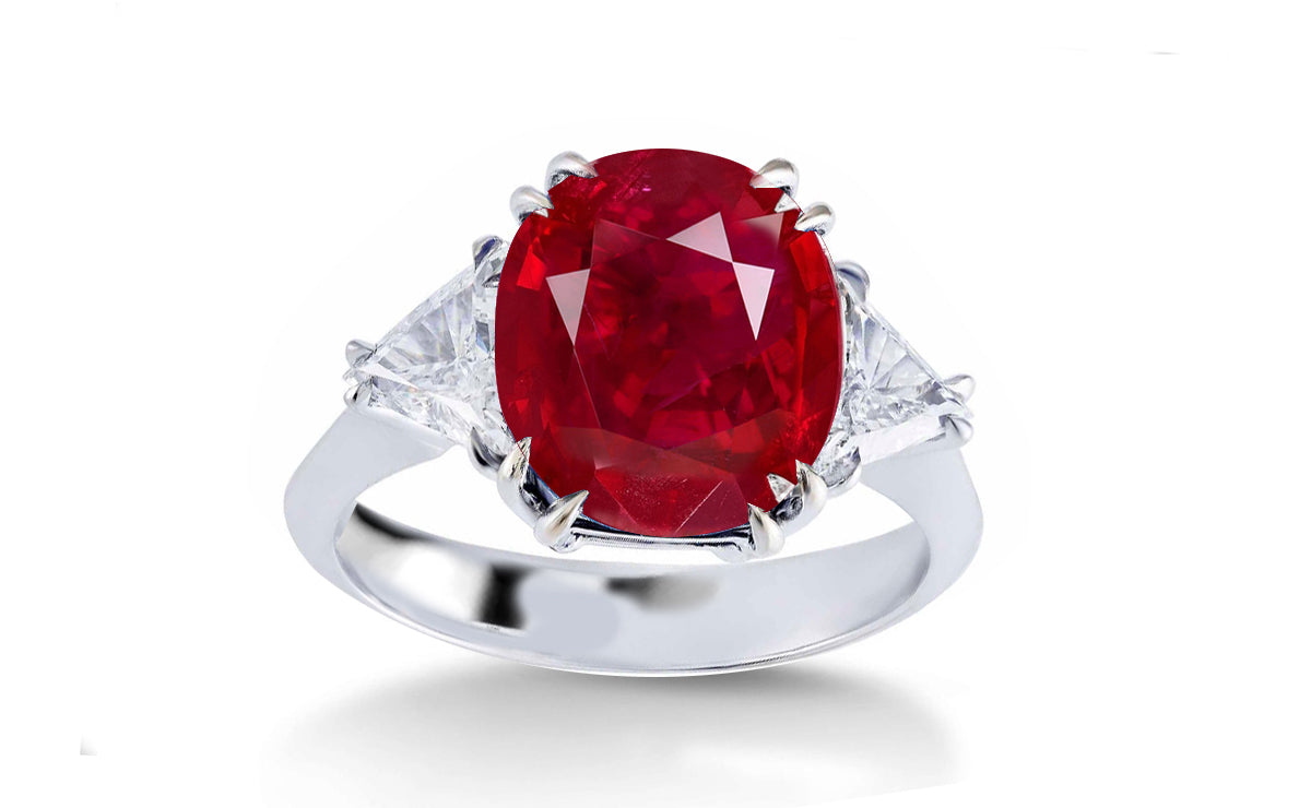 304 custom made unique oval ruby center stone and trillion diamond accent three stone engagement ring