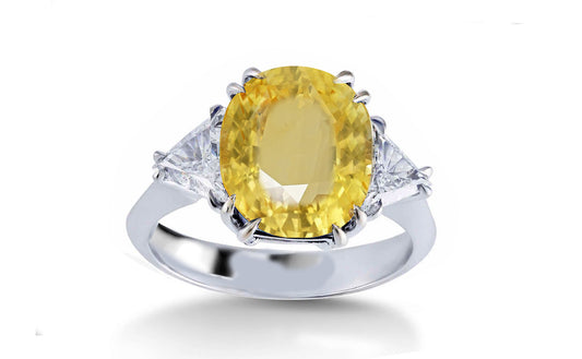 304 custom made unique oval yellow sapphire center stone and trillion diamond accent three stone engagement ring