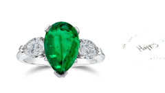 307 custom made unique pears emerald center stone and pears diamond accent three stone engagement ring