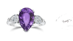 307 custom made unique pears purple sapphire center stone and pears diamond accent three stone engagement ring