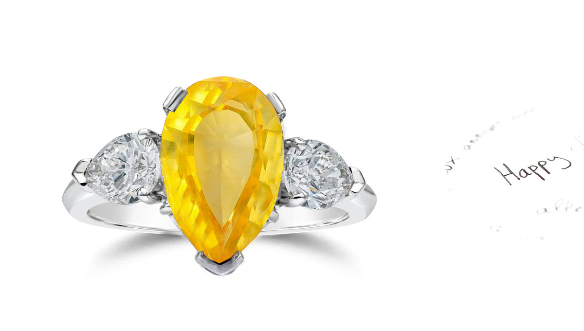 307 custom made unique pears yellow sapphire center stone and pears diamond accent three stone engagement ring