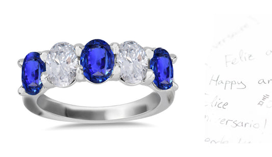 311 custom made unique oval blue sapphire and diamond five stone anniversary ring