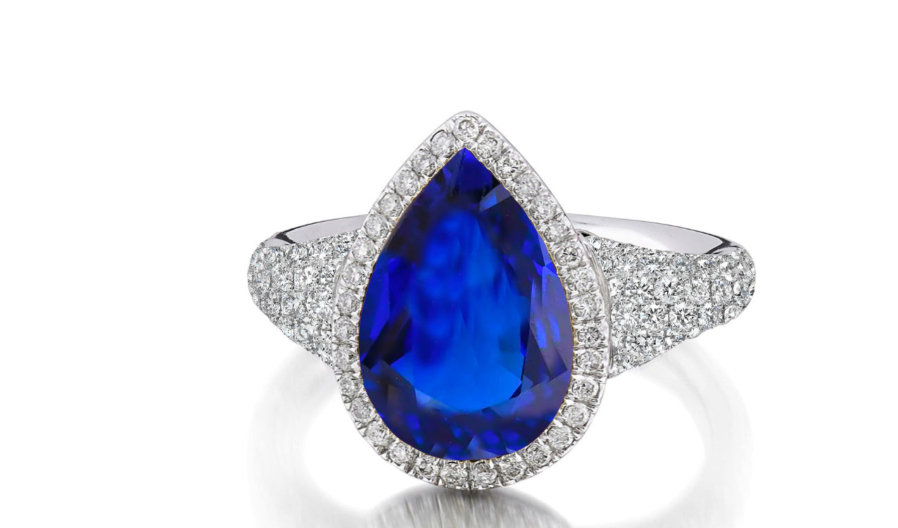 315 custom made unique pears blue sapphire center stone and diamond halo accent engagement ring