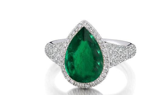 315 custom made unique pears emerald center stone and diamond halo accent engagement ring