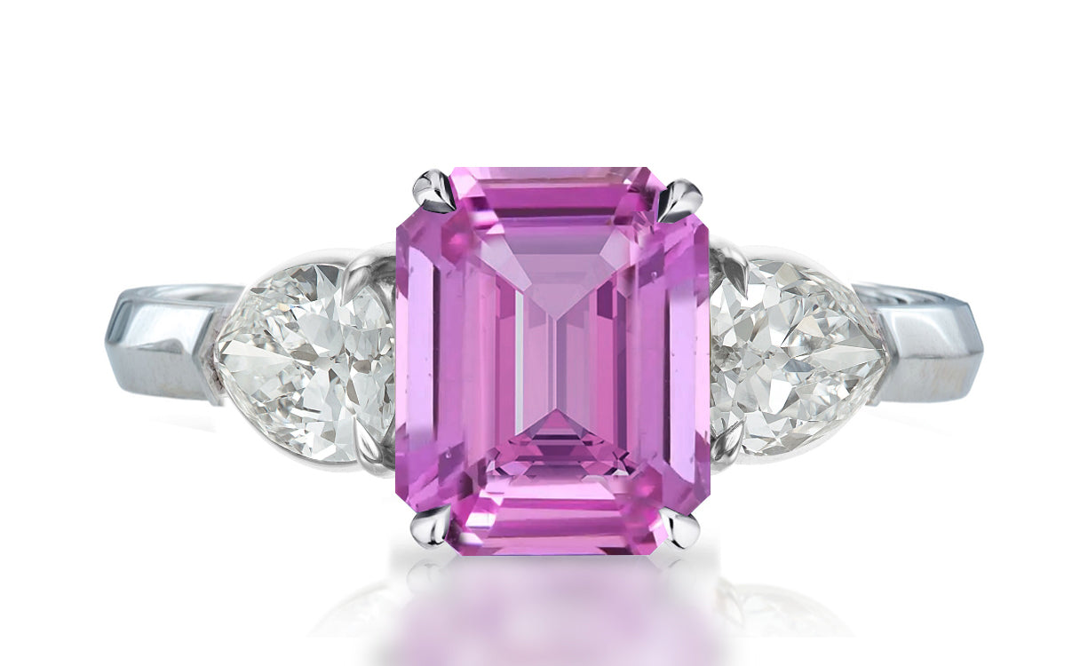 33 custom made unique emerald cut pink sapphire center stone with pear diamond accents three stone engagement ring