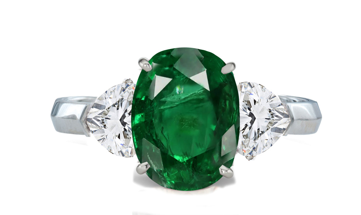 34 custom made unique oval cut emerald center stone with pear diamond accents three stone engagement ring