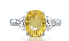 34 custom made unique oval cut yellow sapphire center stone with pear diamond accents three stone engagement ring