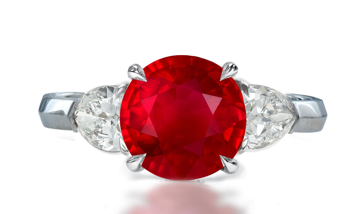 35 custom made unique round ruby center stone with pear diamond accents three stone engagement ring