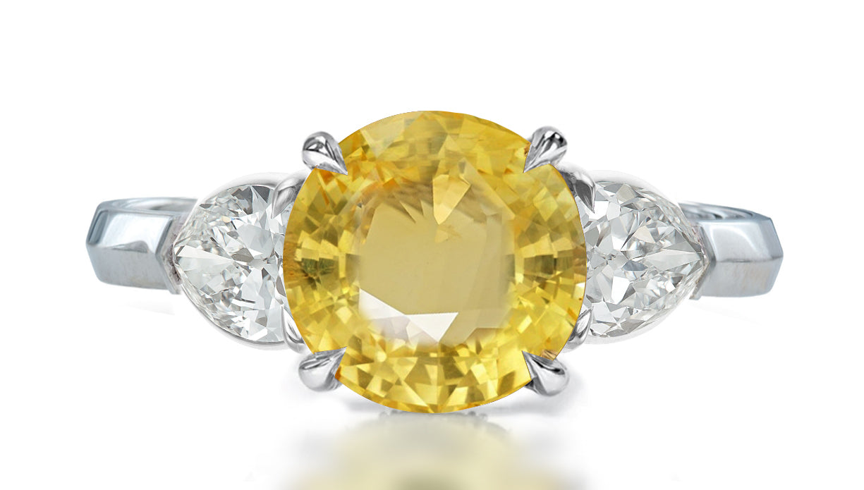 35 custom made unique round yellow sapphire center stone with pear diamond accents three stone engagement ring