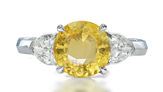 35 custom made unique round yellow sapphire center stone with pear diamond accents three stone engagement ring