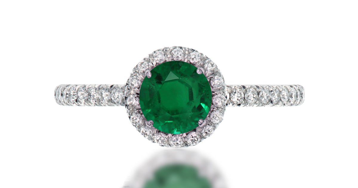 39 custom made unique round emerald center stone with intricate diamond accent halo engagement ring