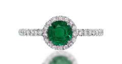 39 custom made unique round emerald center stone with intricate diamond accent halo engagement ring