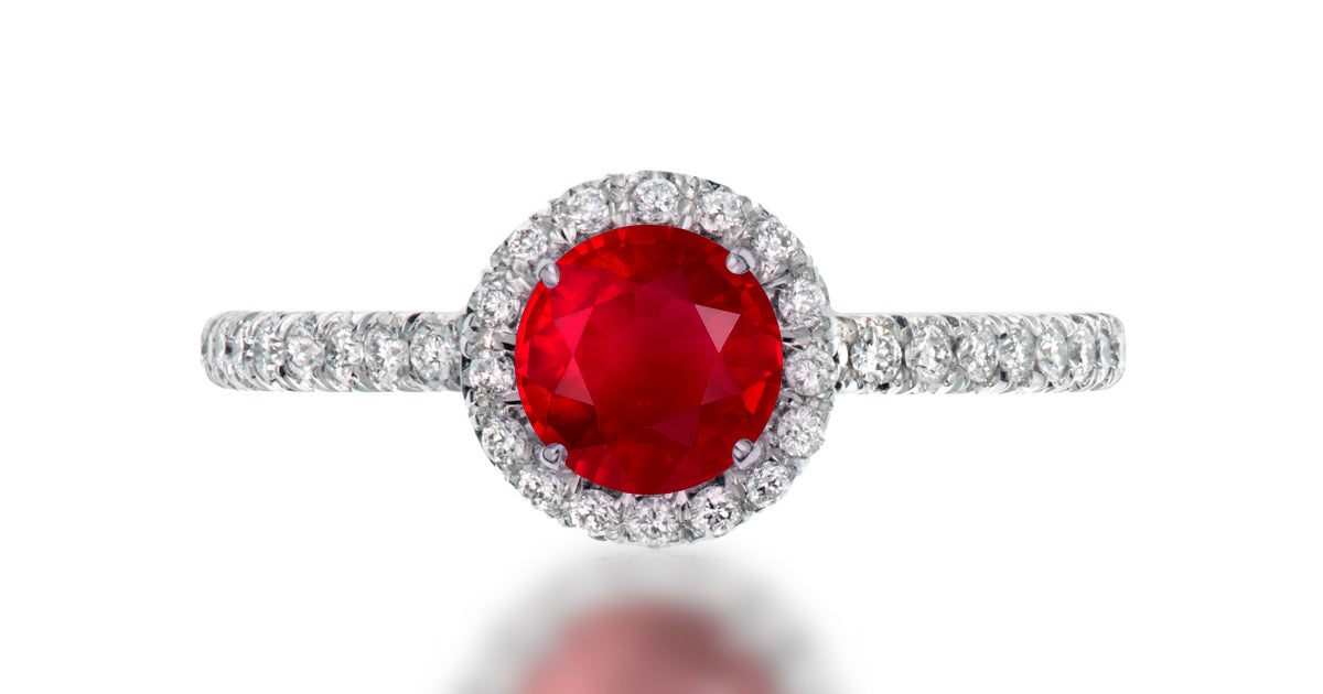 39 custom made unique round ruby center stone with intricate diamond accent halo engagement ring