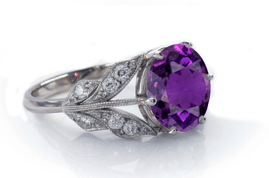 4 custom made purple sapphire and diamond flower halo engagement rings