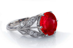 4 custom made ruby and diamond flower halo engagement rings