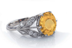 4 custom made yellow sapphire and diamond flower halo engagement rings