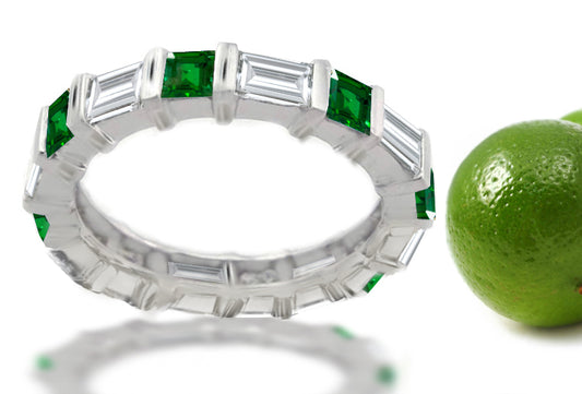 stackable eternity band with alternating square emeralds and baguette diamonds