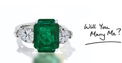 40 custom made unique emerald cut emerald center stone with pear diamond accents three stone engagement ring