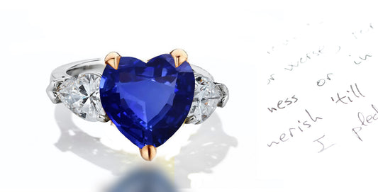 41 custom made unique heart blue sapphire center stone with pear diamond accents three stone engagement ring