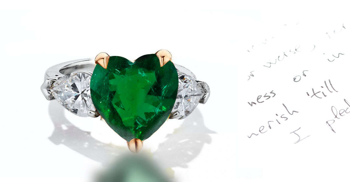 41 custom made unique heart emerald center stone with pear diamond accents three stone engagement ring