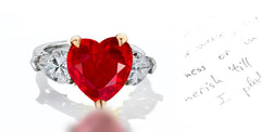 41 custom made unique heart ruby center stone with pear diamond accents three stone engagement ring