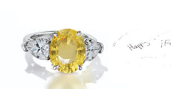 42 custom made unique oval yellow sapphire center stone with pear diamond accents three stone engagement ring