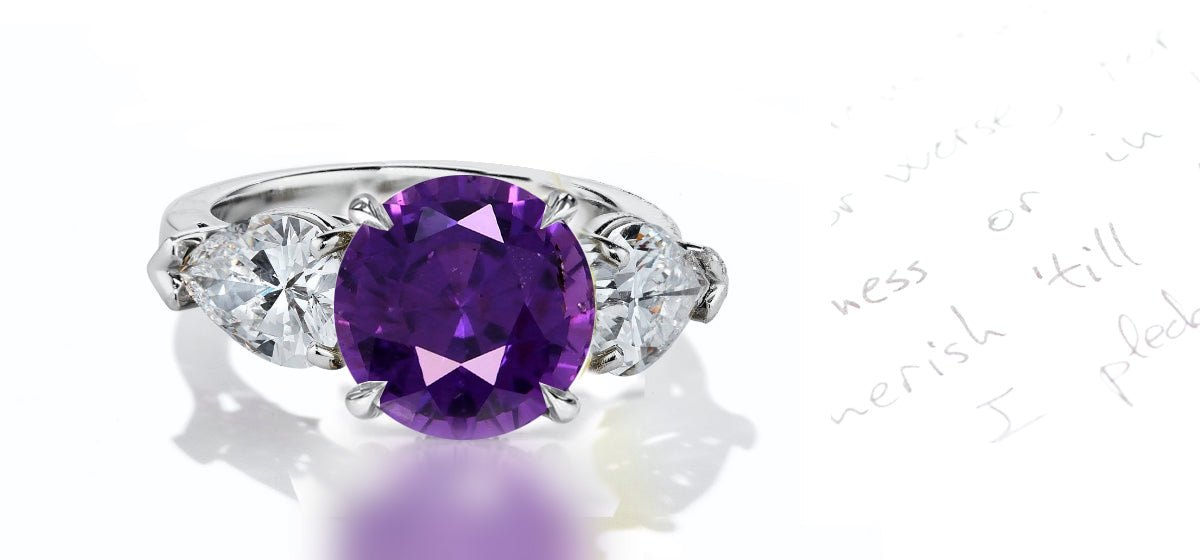 43 custom made unique round purple sapphire center stone with pear diamond accents three stone engagement ring