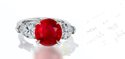 43 custom made unique round ruby center stone with pear diamond accents three stone engagement ring