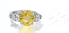 43 custom made unique round yellow sapphire center stone with pear diamond accents three stone engagement ring