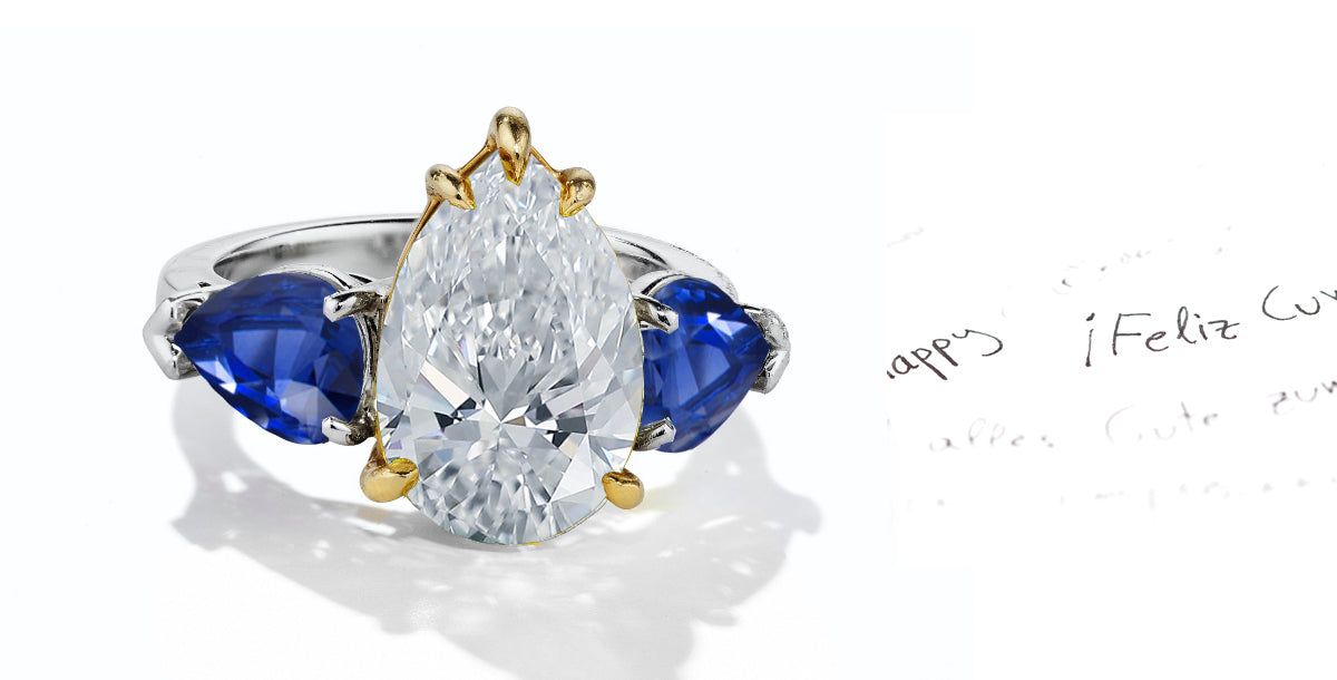 46 custom made unique pear diamond center stone with pear blue sapphire accents three stone engagement ring