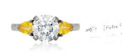 47 custom made unique round diamond center stone with pear yellow sapphire accents three stone engagement ring