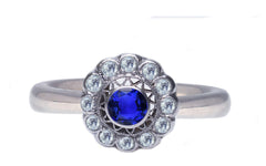 5 custom made blue sapphire and diamond flower halo engagement rings