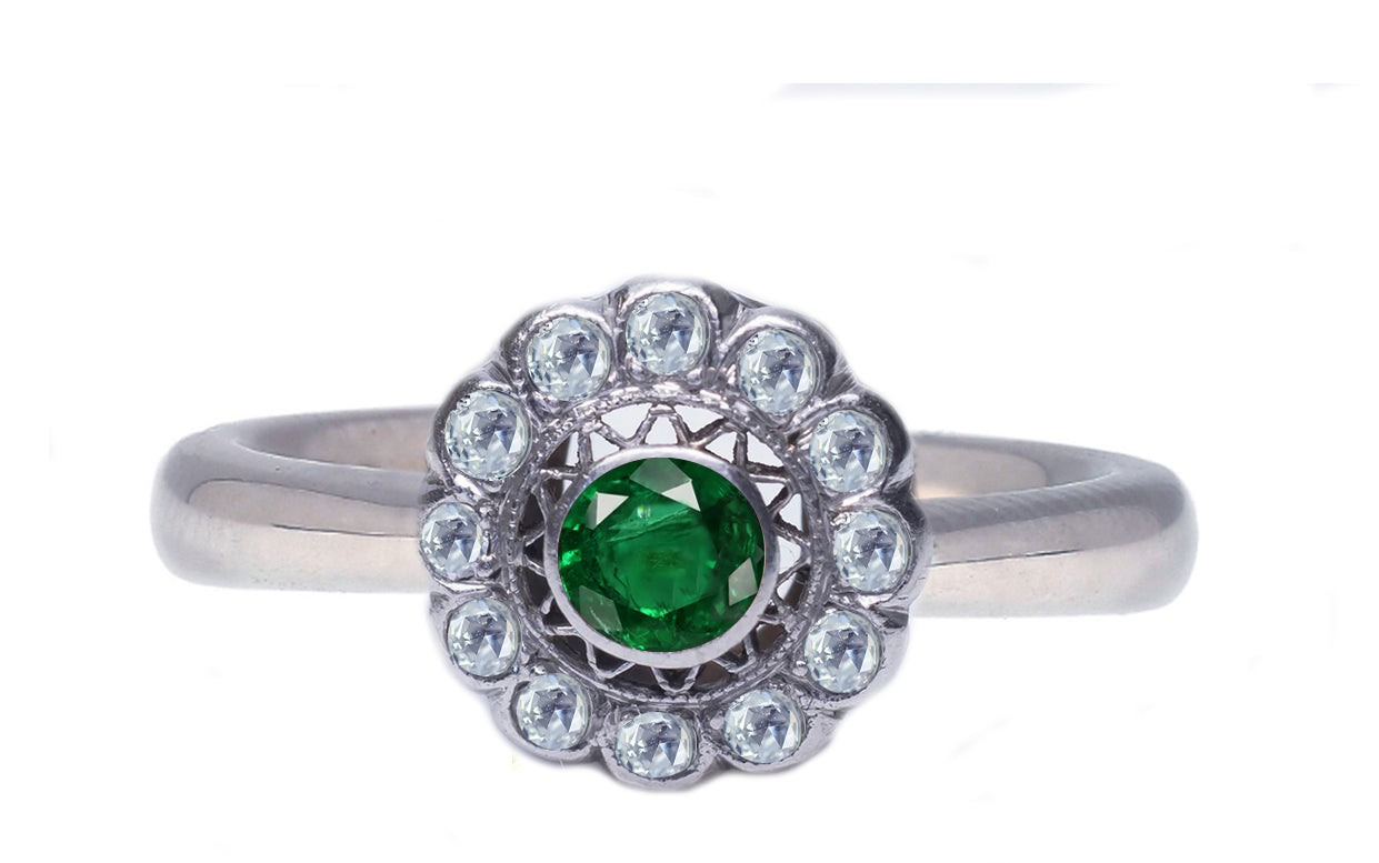 5 custom made emerald and diamond flower halo engagement rings