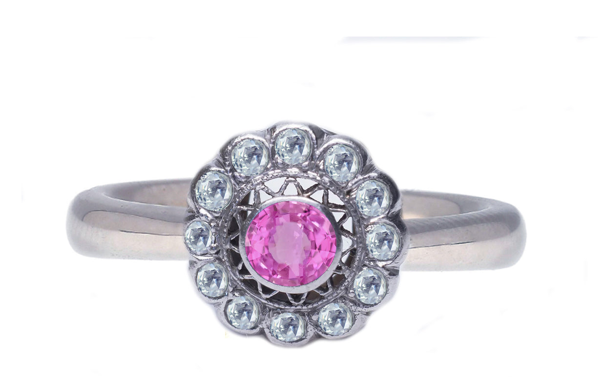 5 custom made pink sapphire and diamond flower halo engagement rings