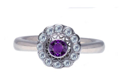 5 custom made purple sapphire and diamond flower halo engagement rings