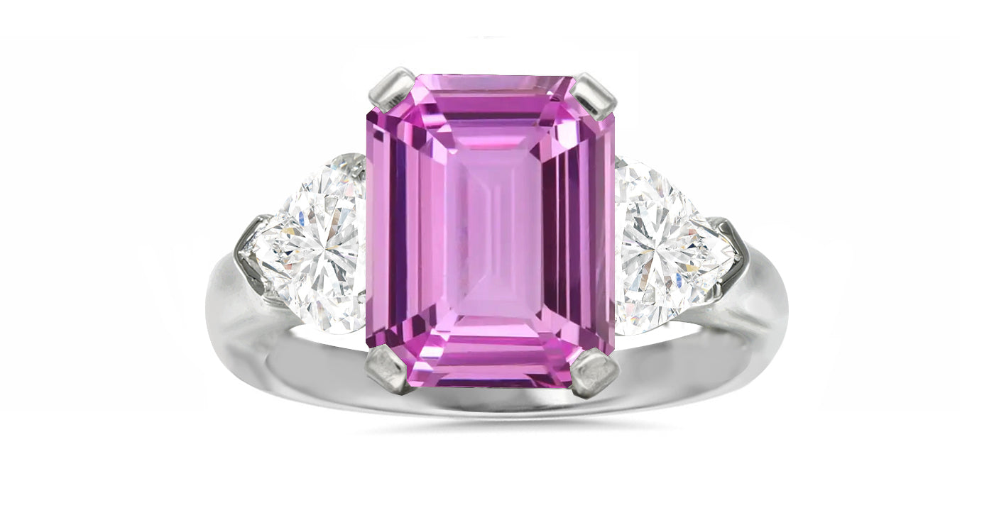 127 custom made unique emerald cut pink sapphire center stone and heart diamond side three stone engagement ring