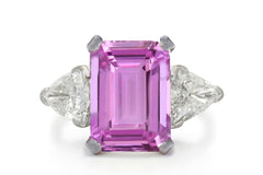 500 custom made unique emerald cut pink sapphire center stone and trillion diamond accents three stone engagement ring