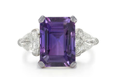 500 custom made unique emerald cut purple sapphire center stone and trillion diamond accents three stone engagement ring