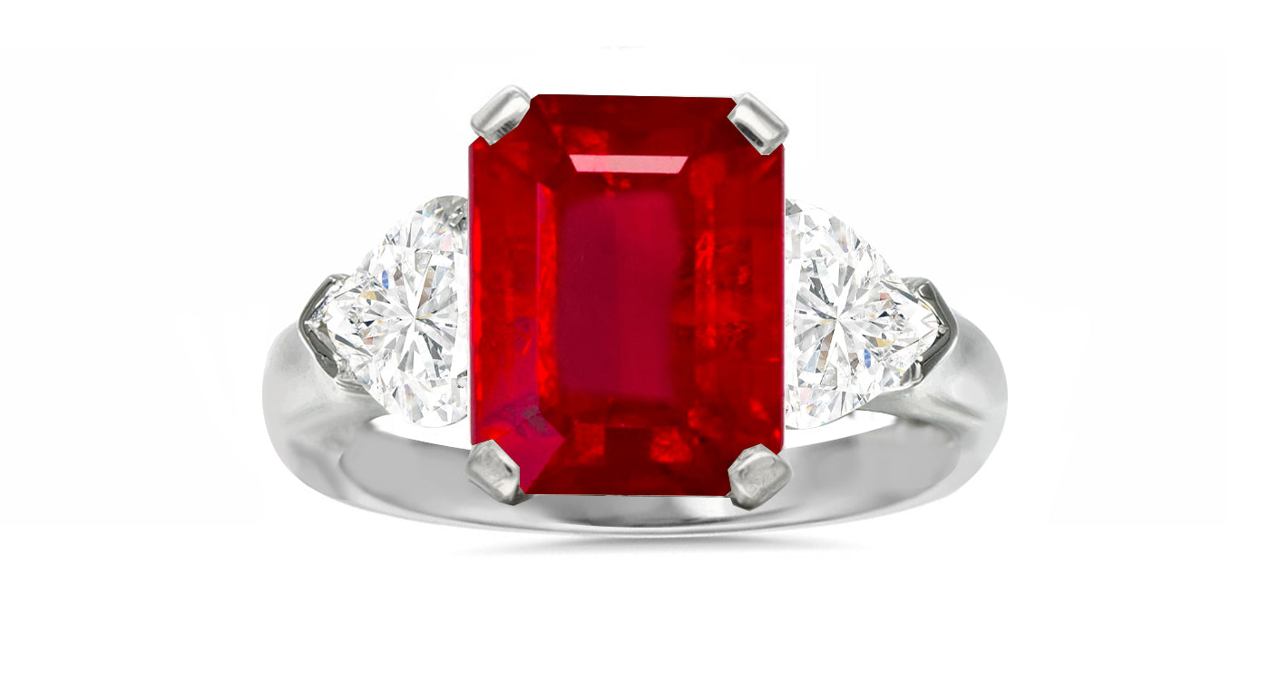 127 custom made unique emerald cut ruby center stone and heart diamond side three stone engagement ring