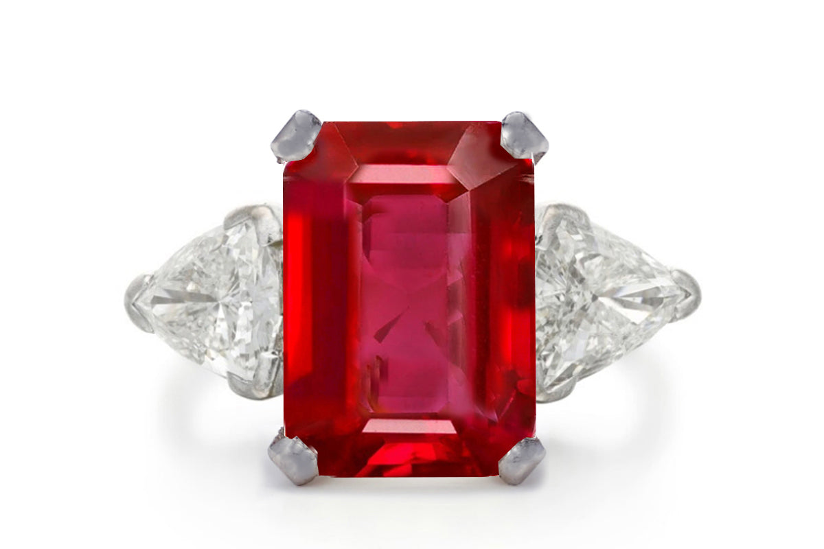 500 custom made unique emerald cut ruby center stone and trillion diamond accents three stone engagement ring