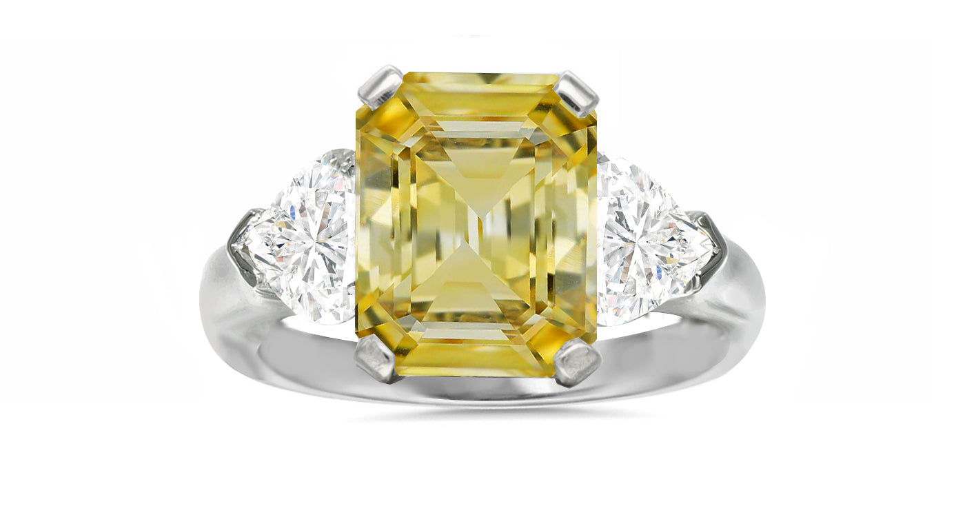 127 custom made unique emerald cut yellow sapphire center stone and heart diamond side three stone engagement ring