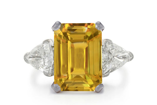 500 custom made unique emerald cut yellow sapphire center stone and trillion diamond accents three stone engagement ring