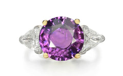 501 custom made unique round purple sapphire center stone and trillion diamond accents three stone engagement ring