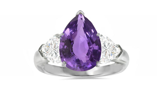 502 custom made unique pear purple sapphire center and heart diamond accents three stone engagement ring