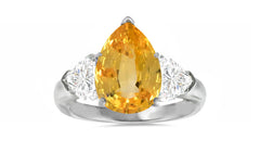 502 custom made unique pear yellow sapphire center and heart diamond accents three stone engagement ring