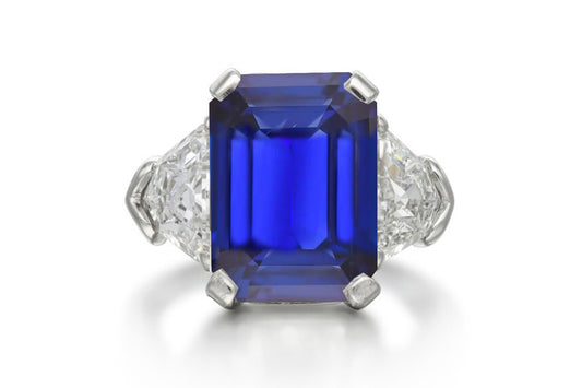 504 custom made unique emerald cut blue sapphire center stone and fancy diamond accents three stone engagement ring