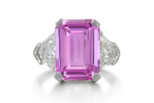 504 custom made unique emerald cut pink sapphire center stone and fancy diamond accents three stone engagement ring