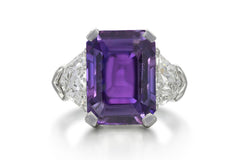 504 custom made unique emerald cut purple sapphire center stone and fancy diamond accents three stone engagement ring