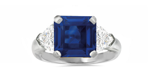 504 custom made unique square blue sapphire center and heart diamond accents three stone engagement ring